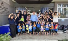 Mr. Peter Karsten, CEO of STARTRADER with the Slum Care Child team and kids.